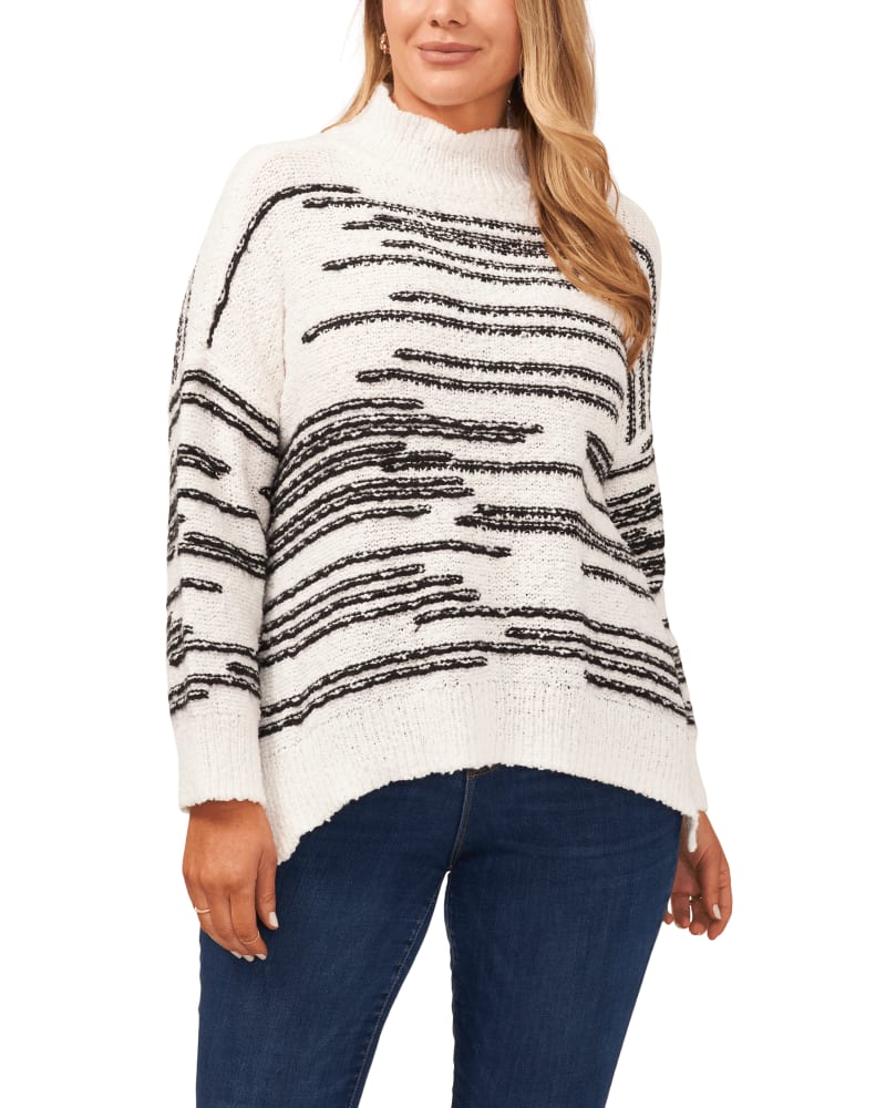 Front of a model wearing a size 1X Grace Striped Turtleneck Sweater in Antique White by Vince Camuto. | dia_product_style_image_id:261600